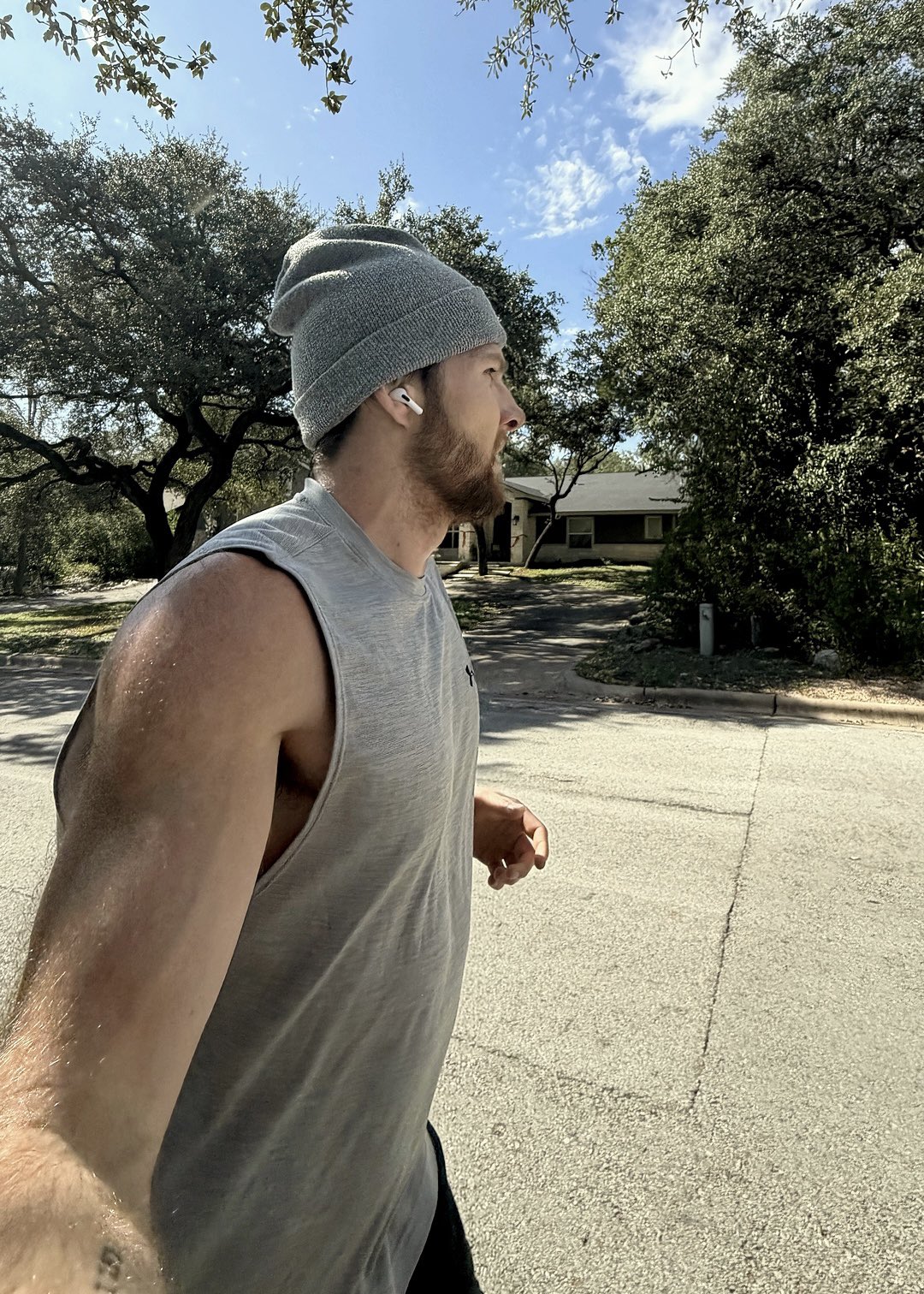 Brady Wilson running outdoors in Austin, Texas.